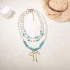 Personalized trend handmade beads multi-layer stacking alloy bow pendant necklace versatile niche design sense
