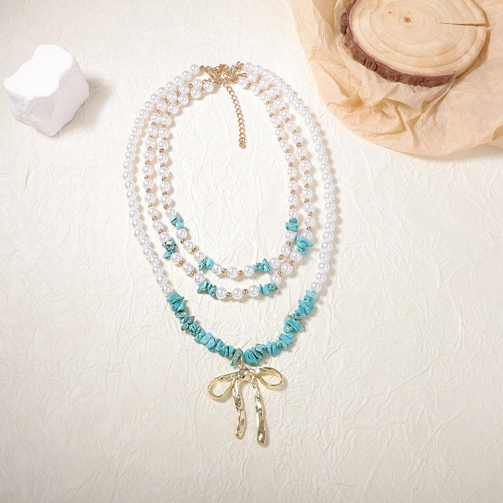 Personalized trend handmade beads multi-layer stacking alloy bow pendant necklace versatile niche design sense