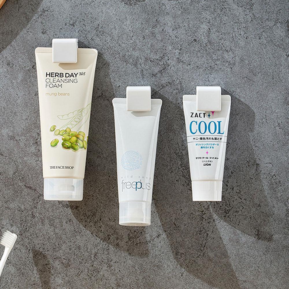 Traceless Plastic Clip for Toothpaste Self Adhesive Hanging Toothpaste Stand Dispenser for Bathroom Use