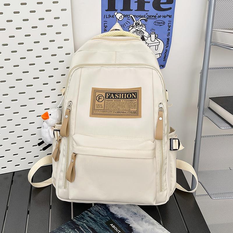 2025 new backpack girls college student schoolbag boys junior high school high school students primary school students large capacity travel backpack