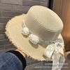 Flower Bow Woven Straw Hat Women's Summer New French Flat Top Top Hat Seaside Beach Sunshade Sunscreen Hat