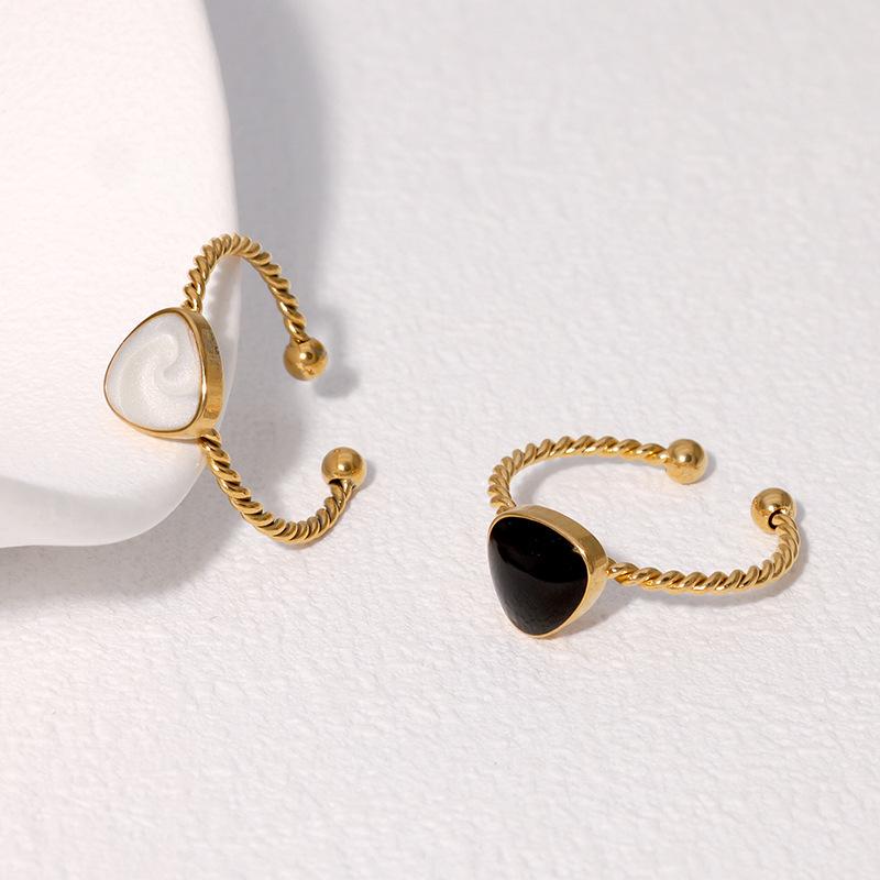 Women's Adjustable Heart-Shaped Twist Ring - Non-Fading Stainless Steel with Niche Design