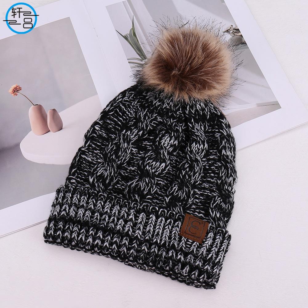 European and American fashion solid color simple warm comfortable knitted hat hairball decoration windproof face small wool hat