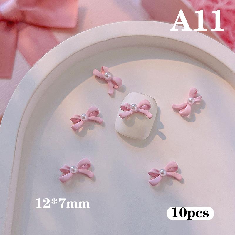 10 Stück Lange Rosa Harz Schleife Nagelkunst Charme 3D Kawaii Mattierte Fee Nagel Schleifen Dekor Teile Diy Design Nagelzubehör