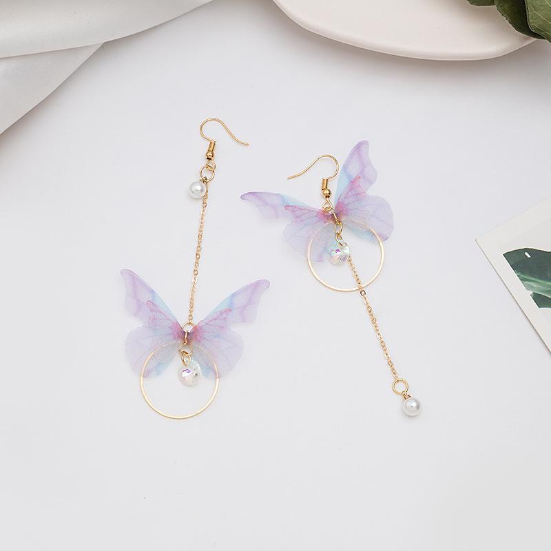 Boucles d'oreilles asymétriques à pampilles papillon avec perles et zirconiums du Japon et de Corée