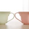 Nuovo set di tazze da caffè europee, tazza da caffè creativa, set di tazza e piattino da caffè a forma di cuore in ceramica, tazza da caffè inglese.