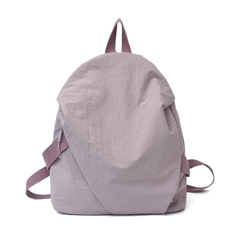 Schoolbag High-value backpack Women's simple solid color casual versatile backpack Light commuter travel bag Male college student schoolbag