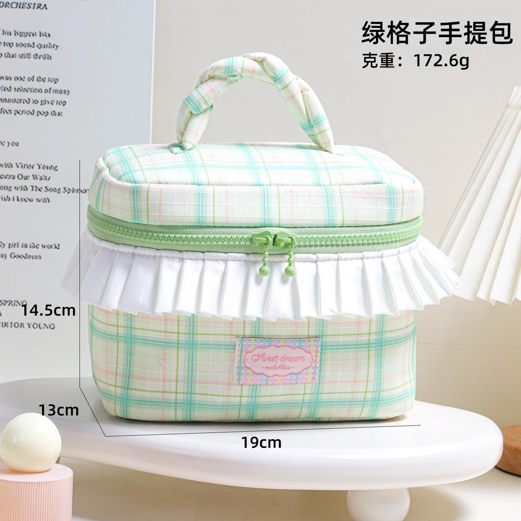 Korean-style niche design twisted handle makeup bag with large capacity pleated lace storage bag, color-blocked plaid wash bag.