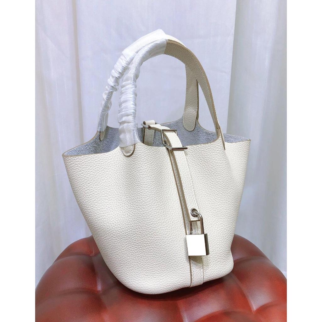 Spot wholesale top layer cowhide vegetable basket bag leather bucket bag commuter fashion lock buckle hand-held handbag woman