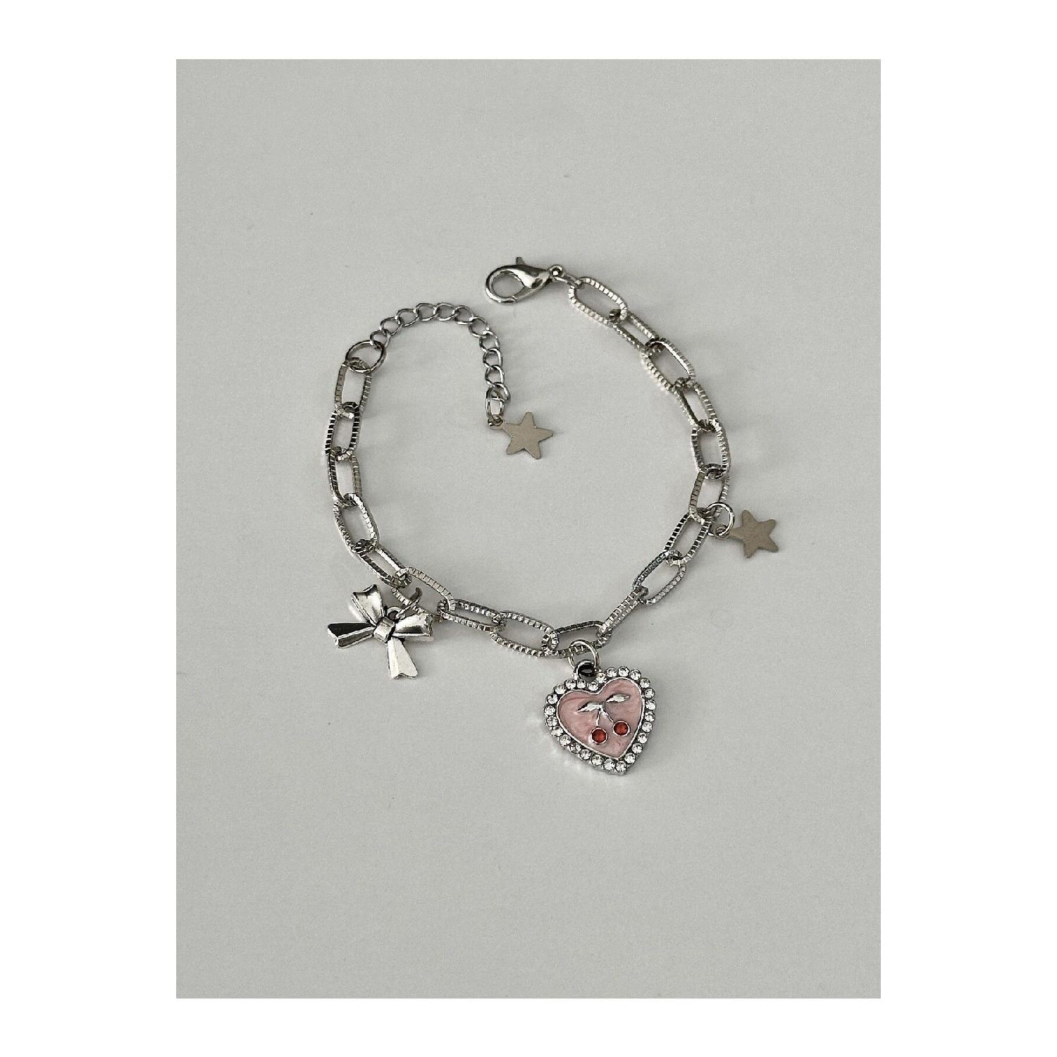 

Кокетка з товстого ланцюжка з рожевим каменем і вишневим серцем рожевий