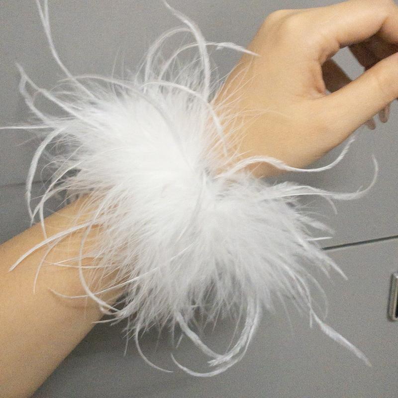 

Настоящие манжеты из страусиных перьев женские нарукавники на запястье меховые манжеты Роскошные пушистые перья перьевая манжета браслет на кнопках женские перьевые браслеты на ногу 1pcs