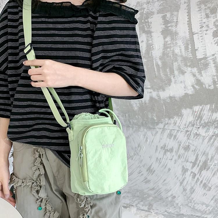 Niche messenger bag shoulder kettle bag water cup bag lightweight outdoor sports mobile phone bag going out portable small satchel tide