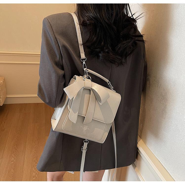 

Женский рюкзак с бантом 2025: Трендовый колледж и незаменимый для путешествий серый