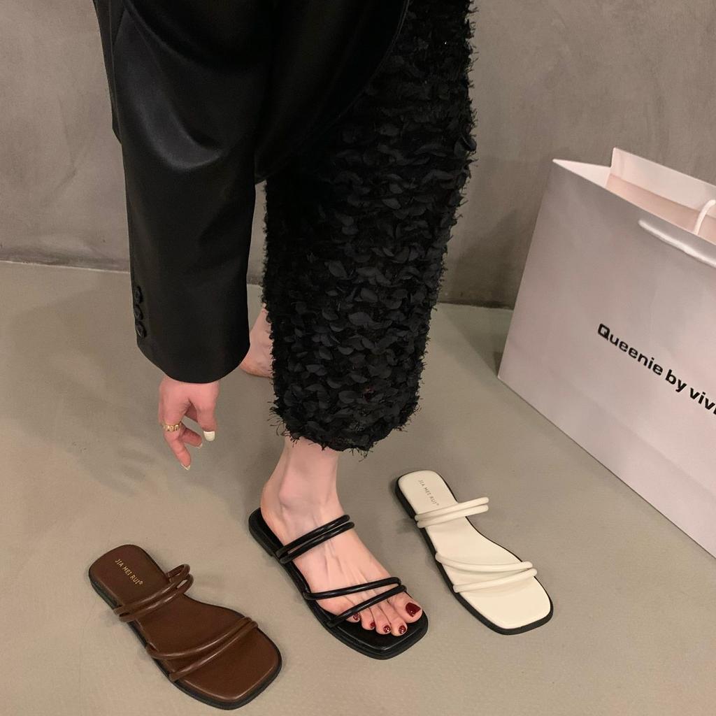 Flat bottom simple temperament one-word slippers fairy shoes wear 2025 summer French sandals beach sandals
