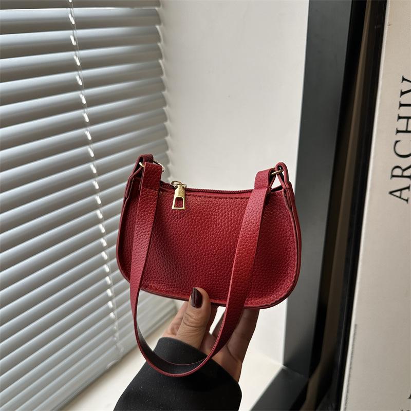 

Stylish new beautiful solid color simple casual texture commuting shoulder portable underarm bag women красный