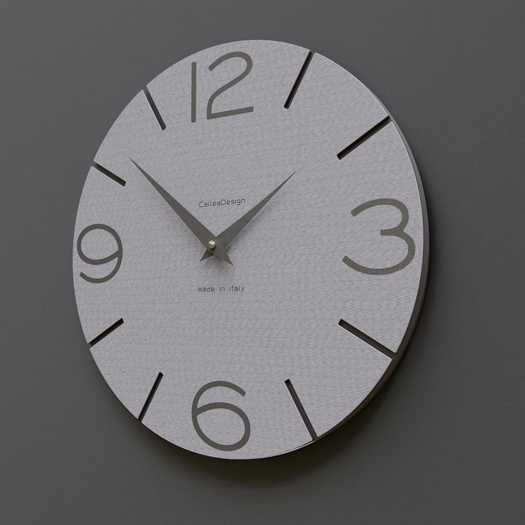 CalleaDesign 30cm kitchen wall clock in a smiley pinstripe pattern. The simple, round dial is easy to read. Metal hands at 11cm and 8cm.