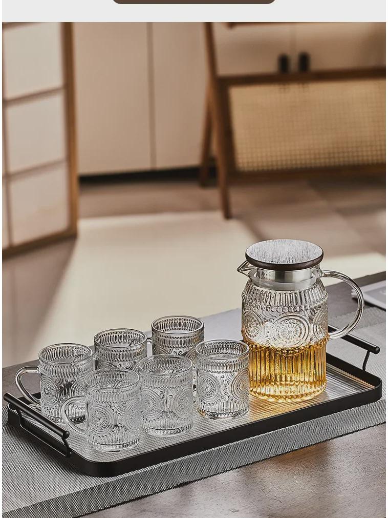 Stylish Heat-Resistant Glass Kettle with Handle - Large Capacity Flower Teapot for Cool Drinks