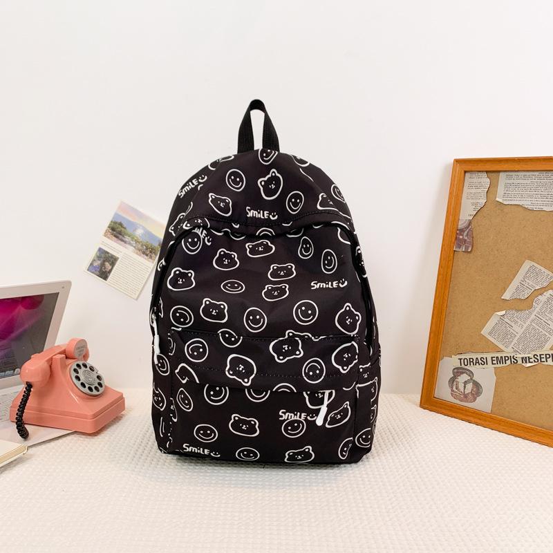 Schoolbag Korean version small fresh backpack 1011 summer graffiti junior high school boys and girls campus schoolbag cartoon print backpack