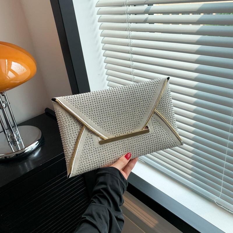 Hot diamond fashion texture trend 2025 early autumn personalized diamond inlaid new casual change clutch bag women's bag