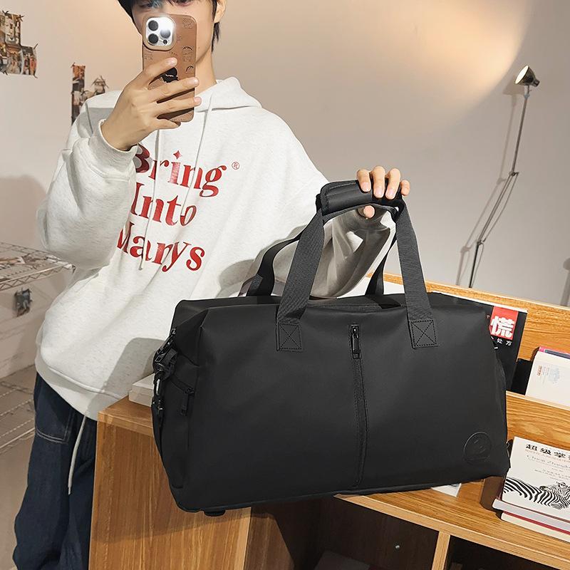 Travel bag Women's light travel handbag Short business trip Portable luggage bag Men's messenger sports fitness bag