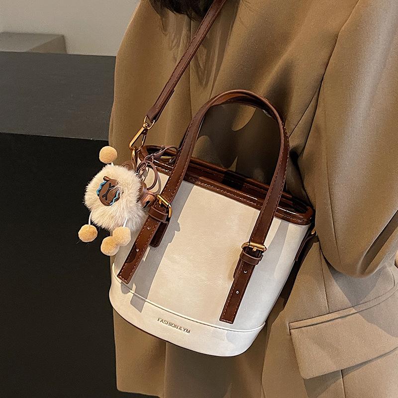 2025 New Fashion Foreign Style Korean Hand Carrying Bucket Bag Simple Casual Versatile Commuter Shoulder Messenger Bag Women