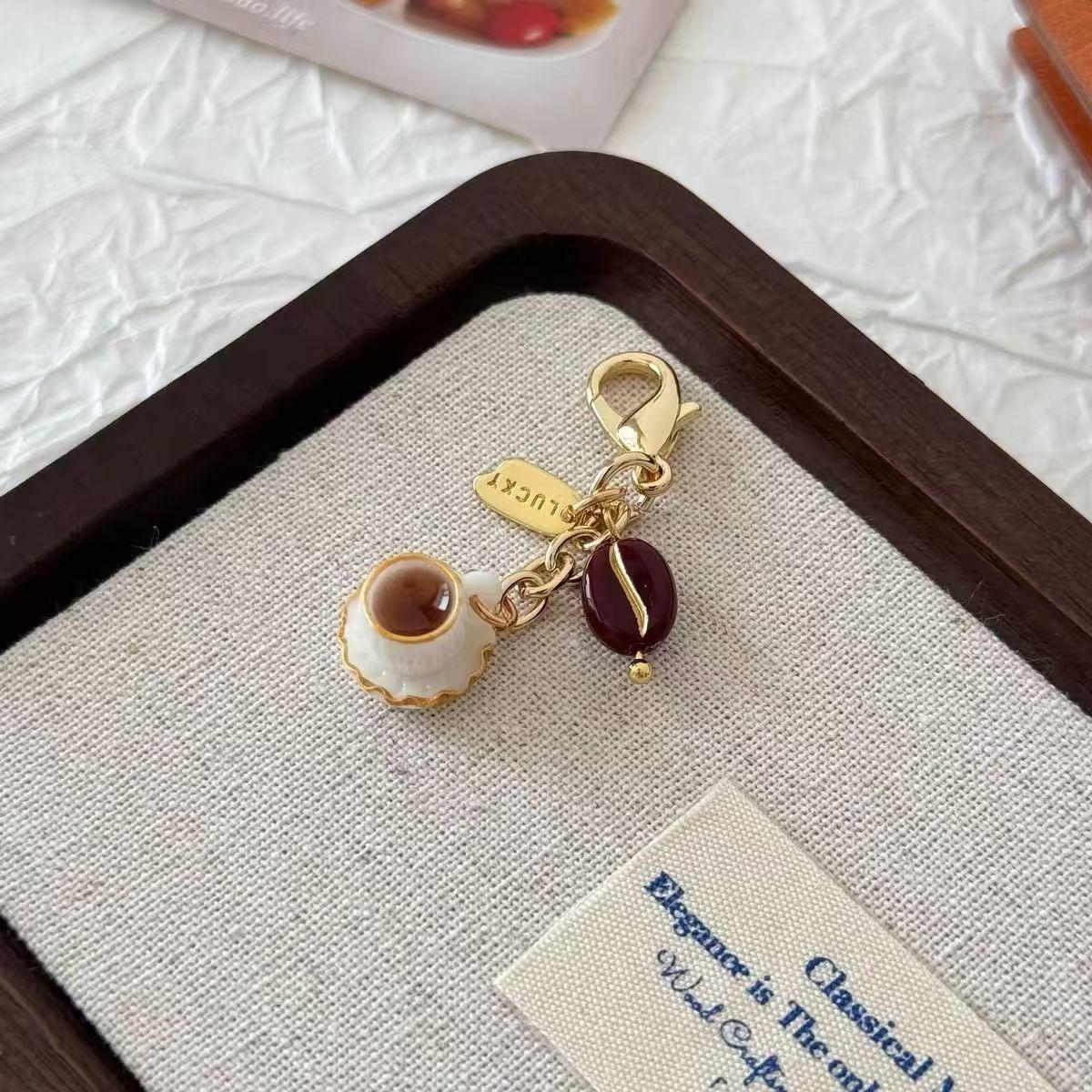 

Unique Coffee Bean Phone Charm Strap Food Toy Keychain Purse Bag Pendant For iPhone 15 Lanyard