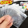 50PCS Mini Self-sealing Clear Bag Protable Travel Jewel Pouch with Sliding Zipper Pill Dispenser Bags Waterproof Storage Bags