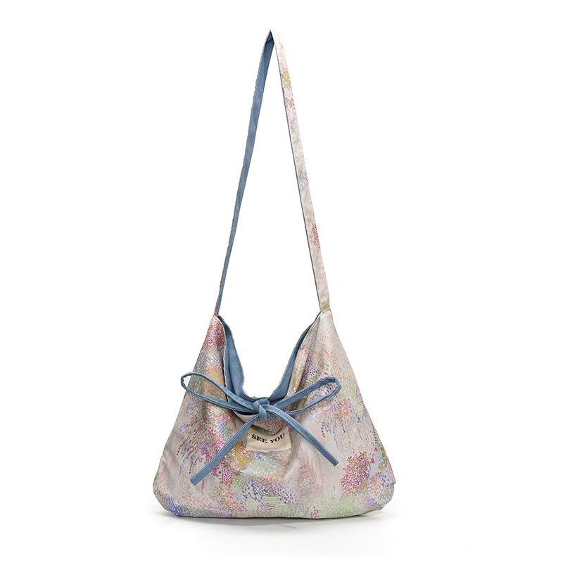 

Эта сумка-тоут большой вместимости — легкая повседневная и художественная женская сумка через плечо на одном плече. белый