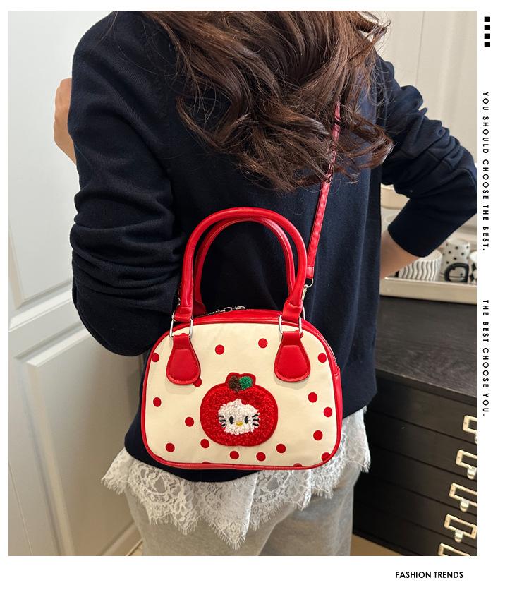 Damen tragbare kleine quadratische Tasche Koreanische Version KT Katze niedlich Nische Pendler Damentasche Frühling und Sommer neue Mode Umhängetasche Kindertasche