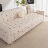 Eine einfache und elegante All-Season-Sofa-Kissen-Schutzhülle mit einer integrierten rutschfesten und kratzfesten Abdeckung