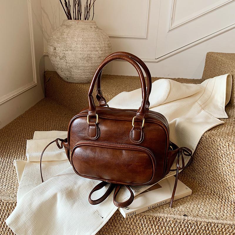 Premium oily leather retro women's backpack 2025 new fashion commuting versatile back bag multi-purpose handbag