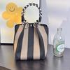 Versatile Large Knitted Handbag with Hollow-Out Flower Pattern