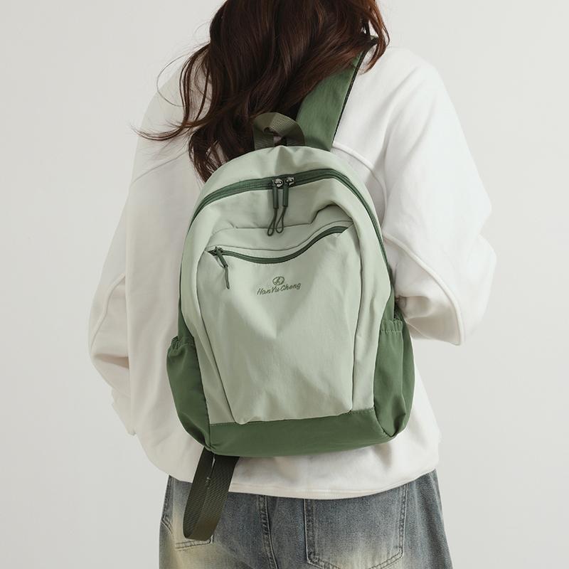 Colorblock Nylon Schulrucksack mit Reißverschlusstasche vorne Lässiger Leichter Tagesrucksack für den täglichen Gebrauch