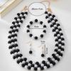 Nuovi Squisiti Design Orecchini, Bracciali, Set Collana con Design Perla Bianca e Nera Lucida