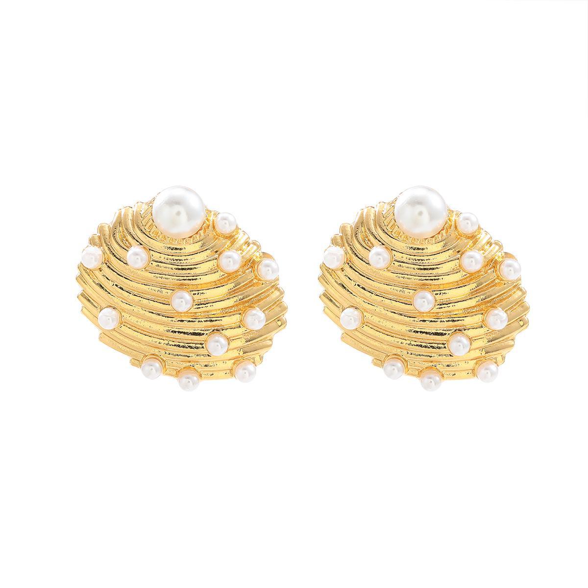 

Женские серьги с жемчугом Конк золотой