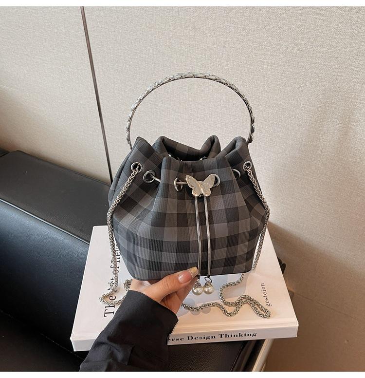 Karomuster Tasche Damen Sommer neue Mode Nische Kette Umhängetasche Kordelzug plissierte Bucket Bag