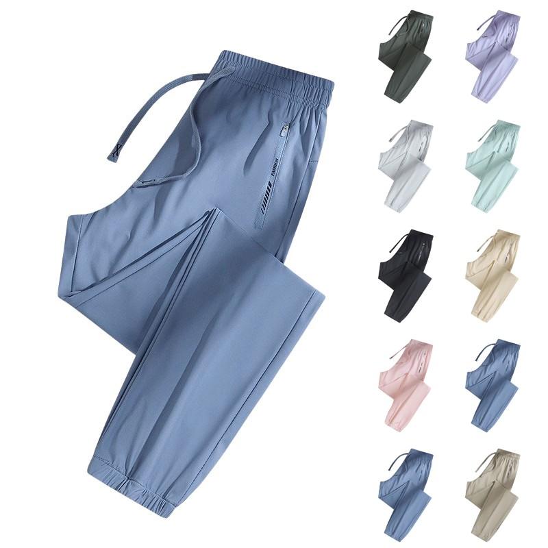 Calça feminina casual cor sólida elástica cintura reta casual com bolsos