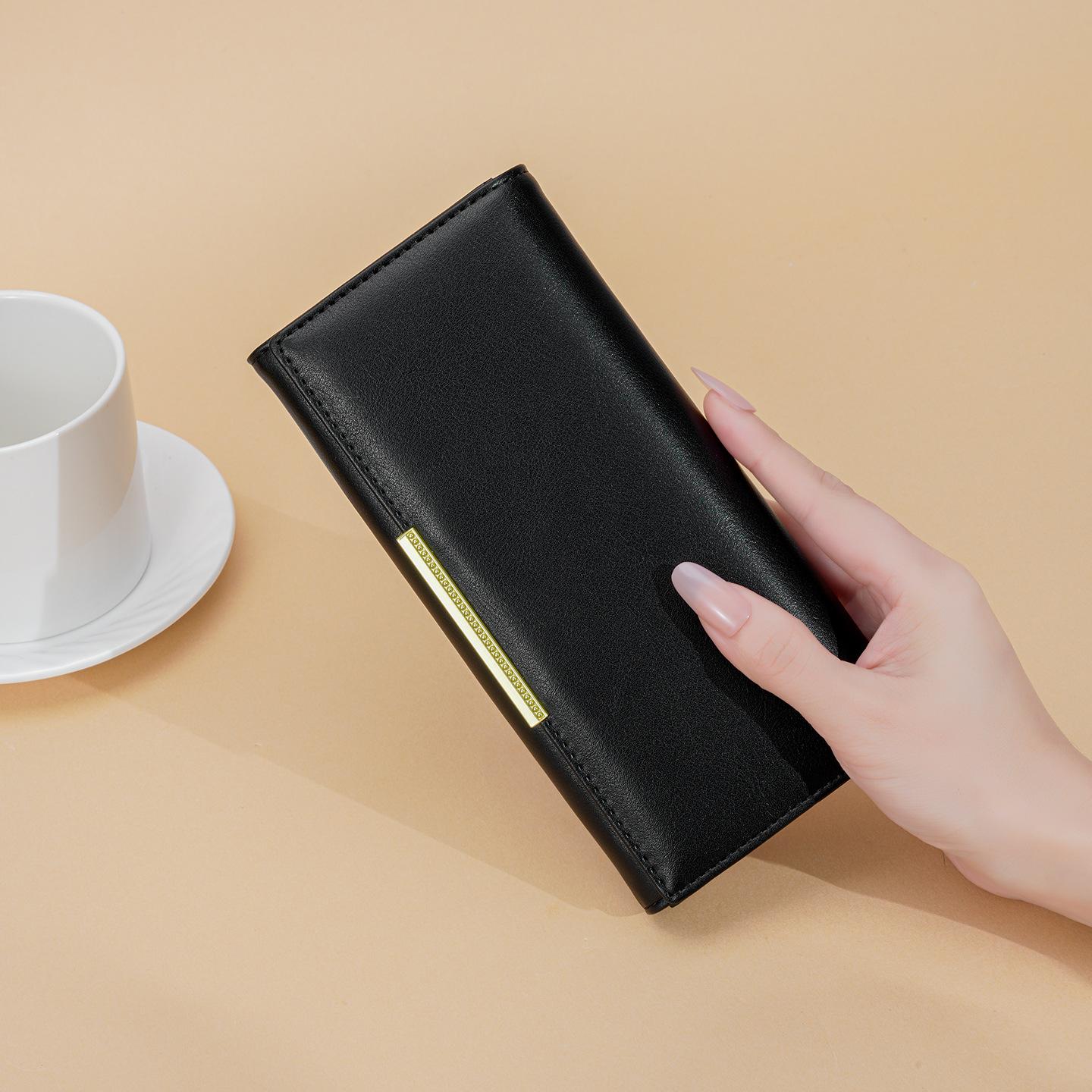 Ladies wallet, texture, gold edged magnetic buckle, two fold, large capacity wallet, multiple card slots, mobile phone carrying bag чёрный