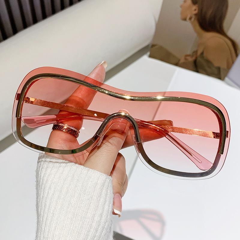 New outdoor cycling sports sunglasses, frameless, stylish, and cool, with a single-piece design and metallic trim, women's sunglasses
