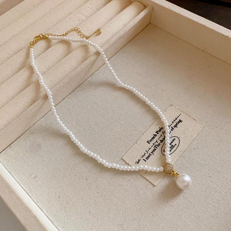 

Элегантное винтажное жемчужное и циркониевое колье на ключицу с золотым покрытием