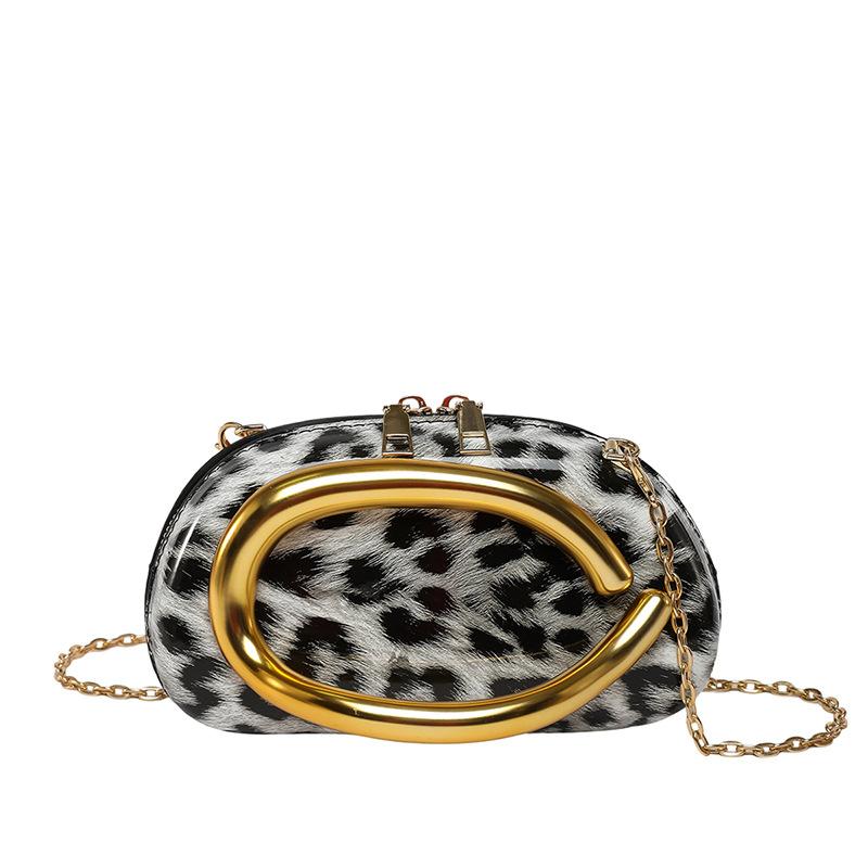 

2025 women s European and American new shoulder messenger bag, special-shaped shell acrylic fashion leopard print dinner bag tide чорний