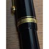 Used PILOT ballpoint pen, black, gold clip