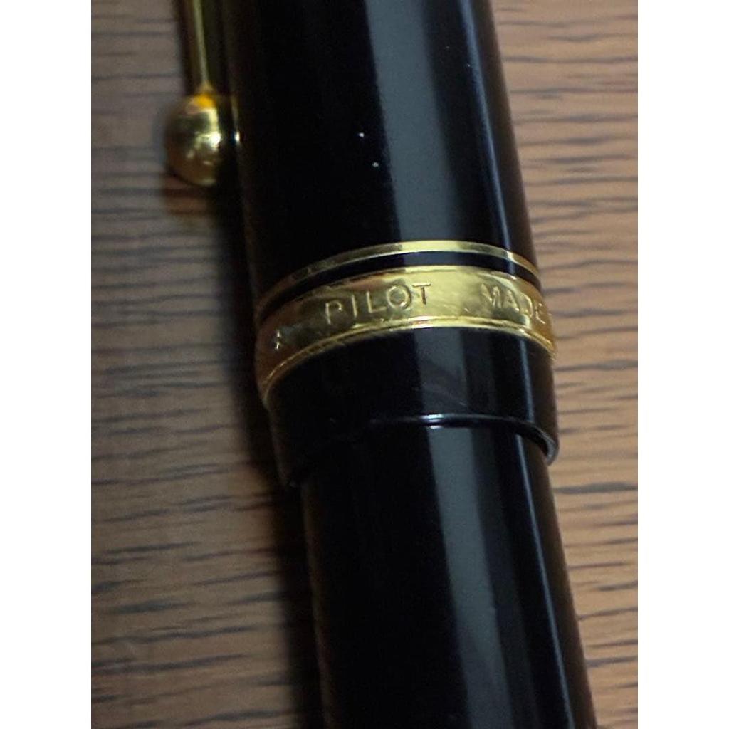 Used PILOT ballpoint pen, black, gold clip