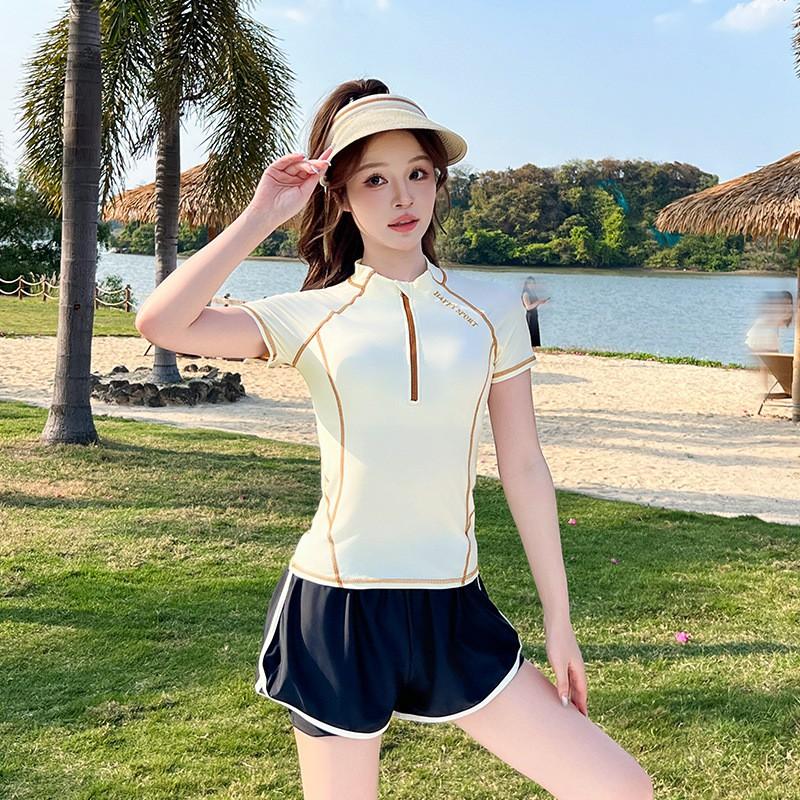 Womens Modest Two-Piece Swim Set With Short Sleeve Top Boxer-Style Bottoms Light Striped Design Swimming Fitness Running