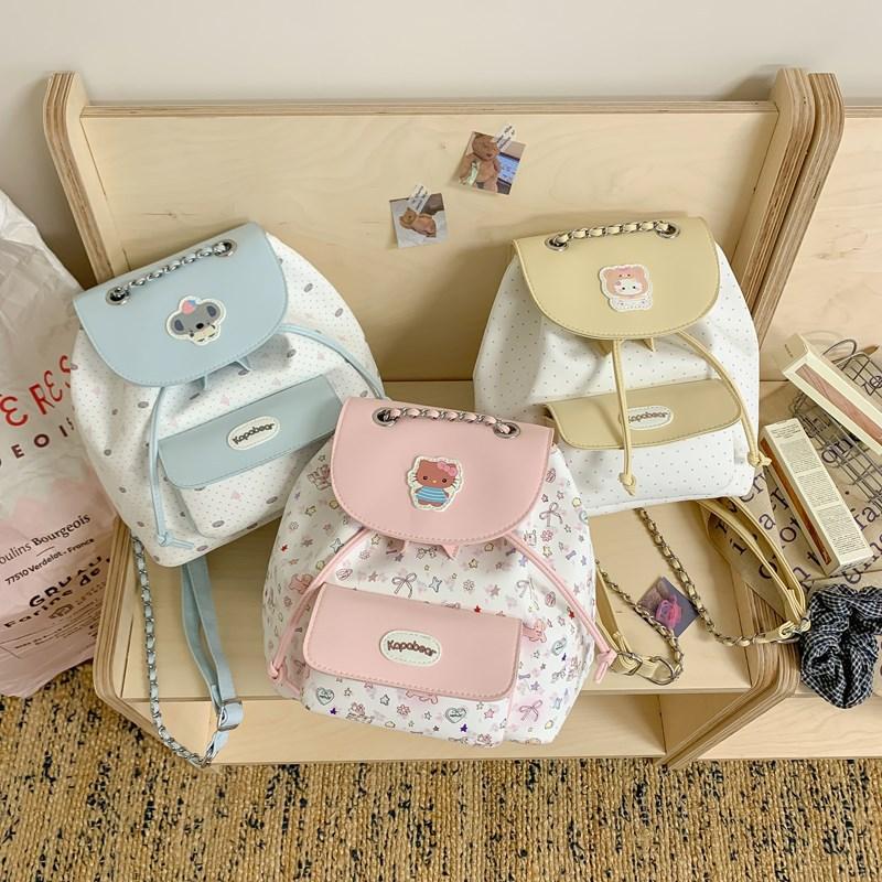 High-value girls toilet bag, simple casual small backpack, cute bow floral college style flip backpack.