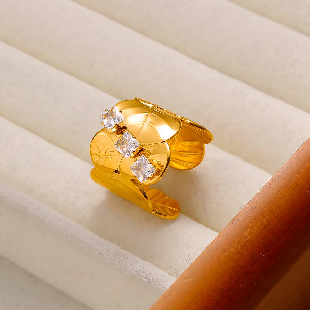 YueShi Luxury Zircon Leaf Ring - European & American Design, Versatile, Elegant, Cross-border Style.