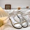 Koreanische Version flacher Boden mit Sandalen Römerschuhe Damenschuhe Französischer Sommerurlaubsstil Silber coole Hausschuhe Strandschuhe