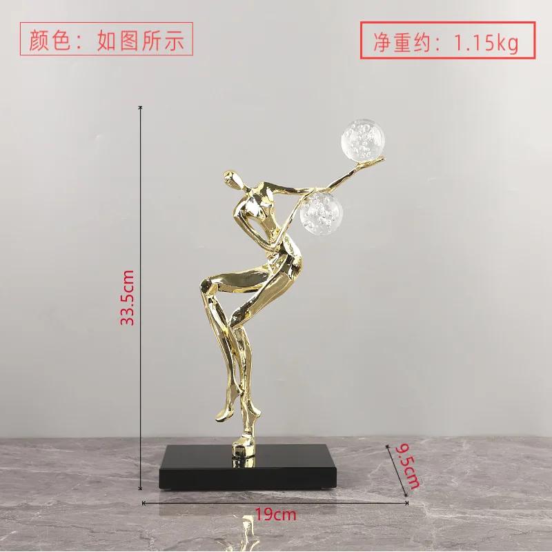 

Metal Handicraft Golden Man Dancing Crystal Ball Acrobatic Figure Sculpture Woman Statue Home Decoration Accessories