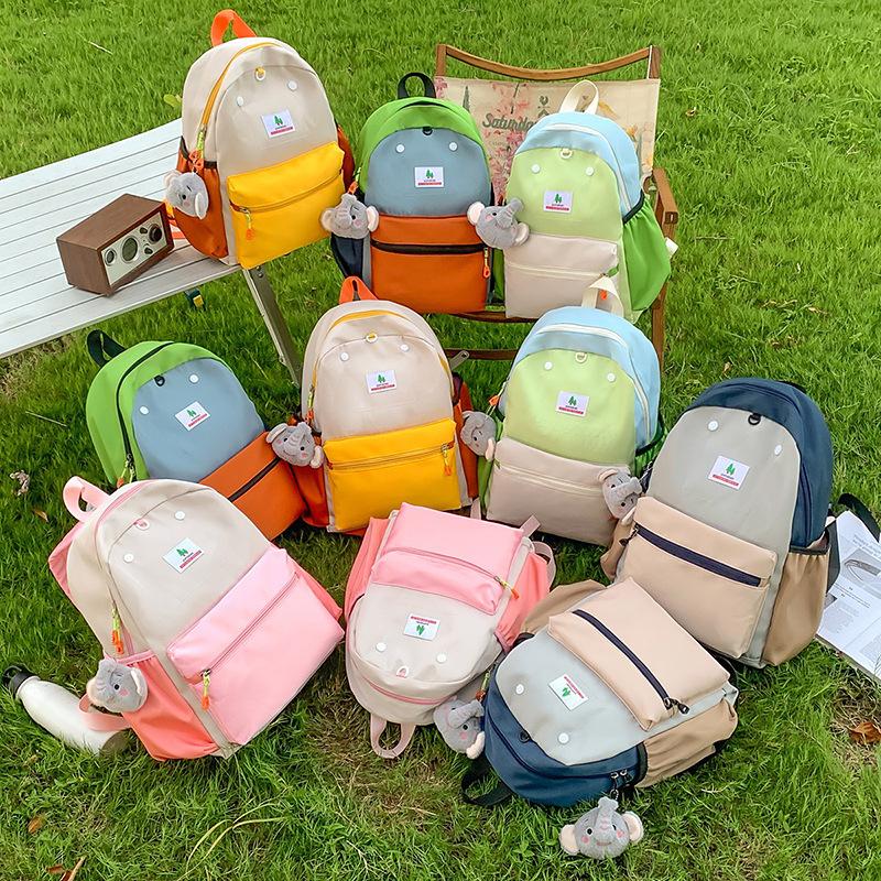 Schoolbag Korean version ins casual versatile backpack schoolbag new contrasting color niche large-capacity backpack primary school girls schoolbag
