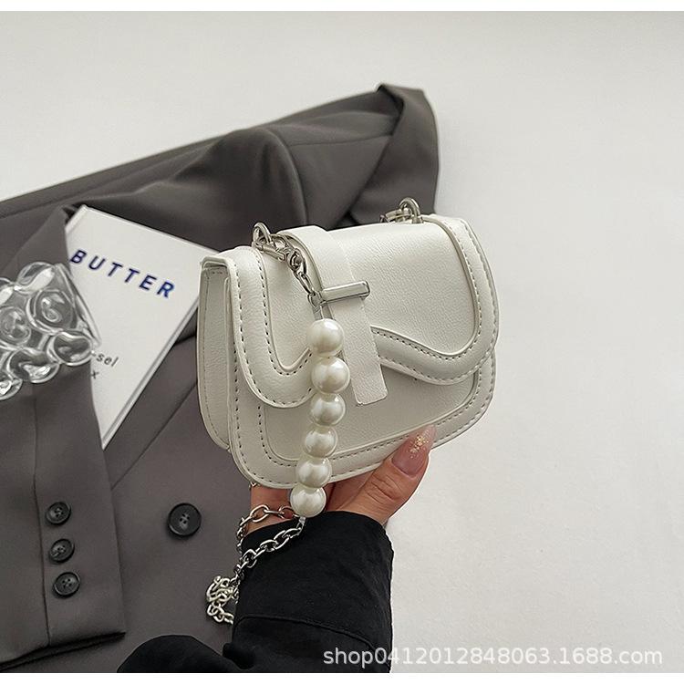 

Жемчужная портативная сумка-седло мини-цепочка кроссбоди маленькая сумка женская 2025 новая корейская версия зарубежный стиль нишевая сумка для помады